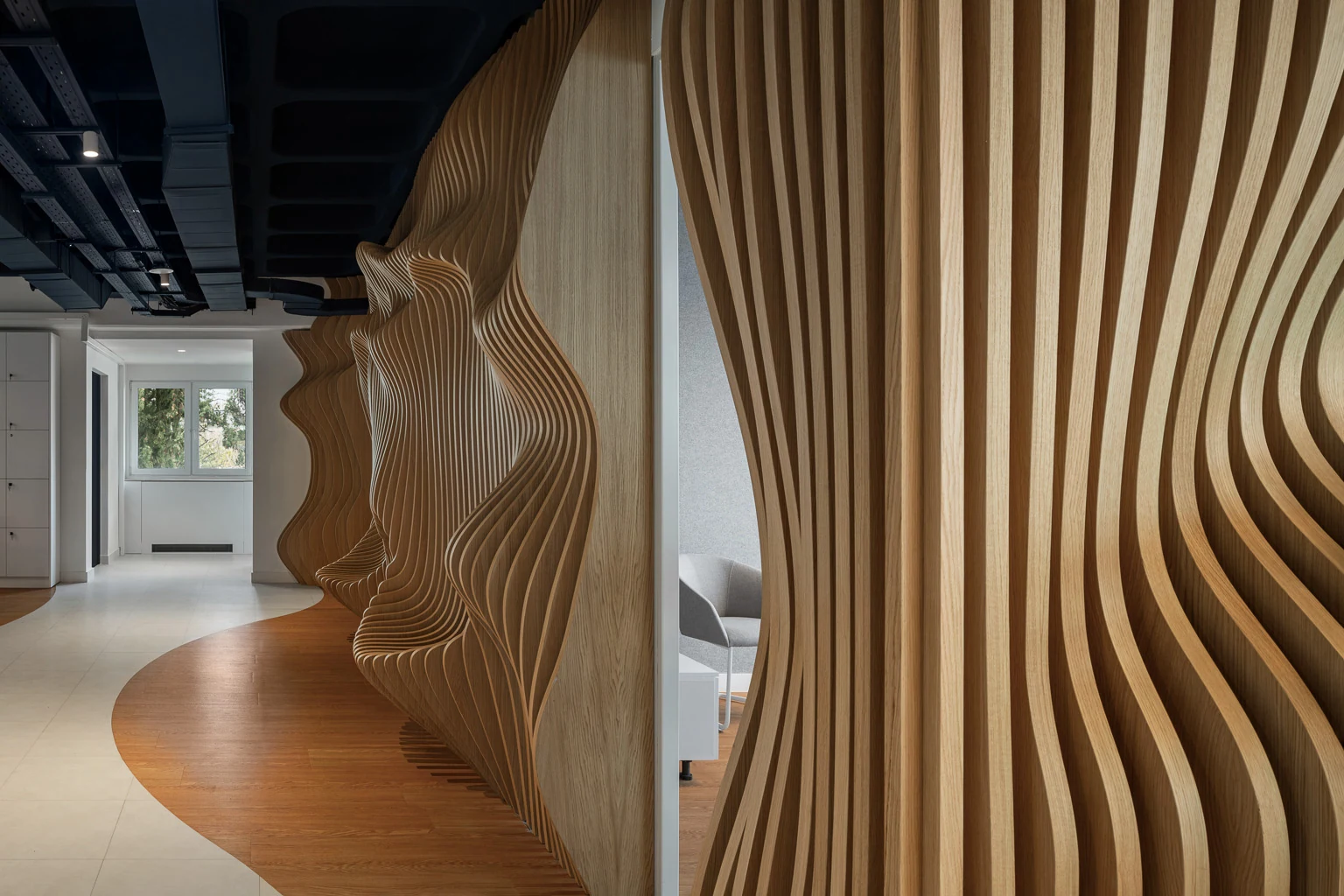 Parametric natural oak facade at Viva Wallet headquarters in Athens